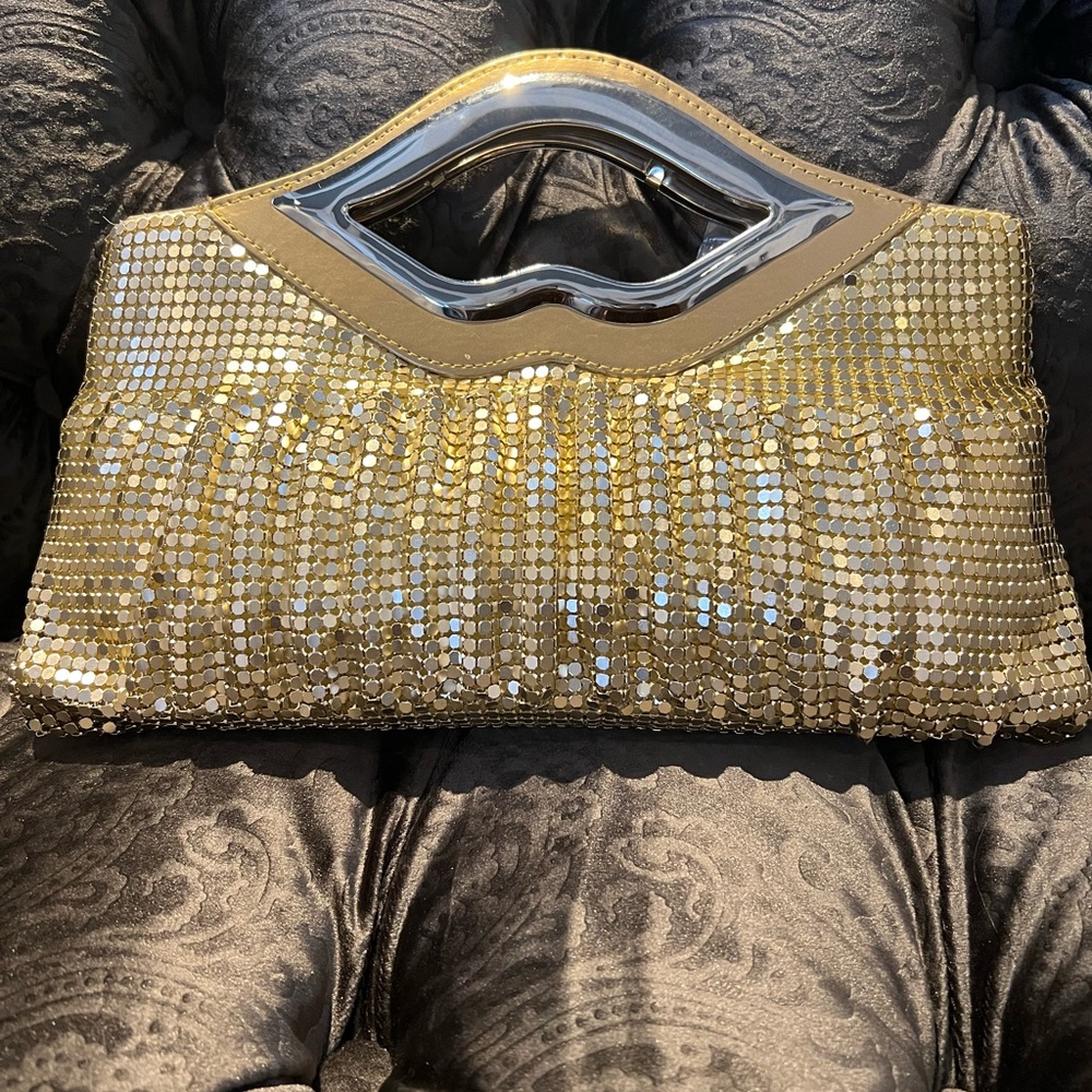 Brand new gold evening clutch